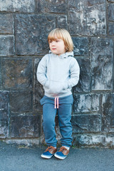 Outdoor portrait of a cute little boy