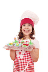 little girl cook with spring flower muffin