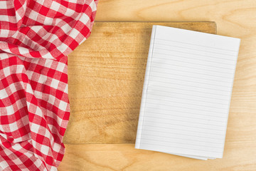 Obraz premium Checkered Tablecloth on wooden background