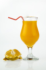 glasses of orange juice and fruits