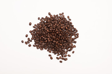 Brown coffee beans isolated on white background