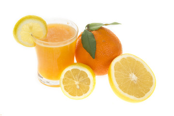 Juice in glass with fresh citrus fruit isolated white