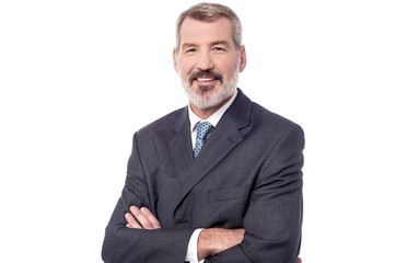 Confident entrepreneur, folded arms.