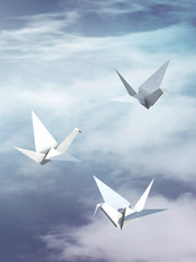 origami paper bird fly in the sky