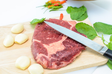 Raw Fresh Meat Slices on Wooden Chopping Board