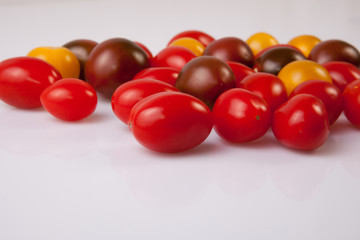 Handful of colorful cherry tomatoes