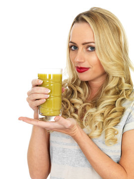 Young Woman Drinking Mango Fruit Juice
