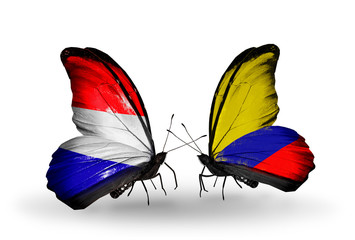 Two butterflies with flags Holland and Columbia
