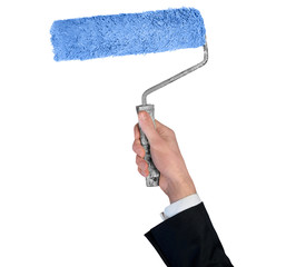 Paint roller in man hand