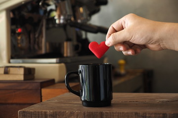vintage color tone style : cup of coffee in coffee shop