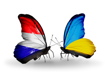 Two butterflies with flags Holland and Ukraine