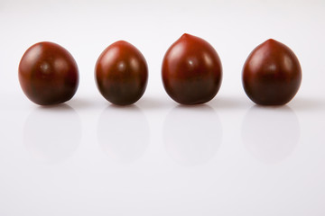 Dark green cherry tomatoes