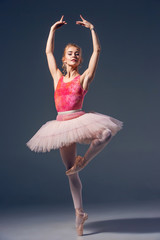 Portrait of the ballerina in ballet pose