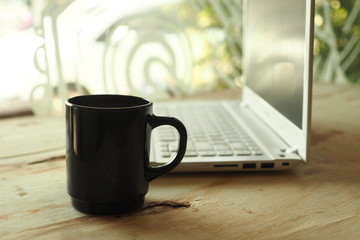 vintage color tone style : cup of coffee in coffee shop