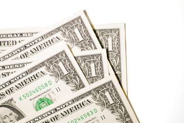A few US banknotes on a white background