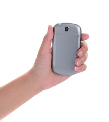 Hand holding and operating a smart phone isolated on white