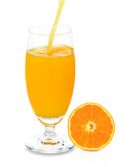 pouring orange juice isolated on white