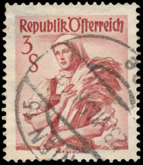 Stamp printed in Austria, shows a woman from Burgenland