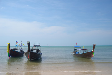 Obraz premium Three wooden boats