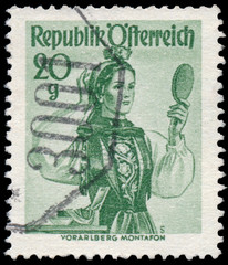 Stamp printed in Austria, shows a woman from Vorarlberg, Montafo