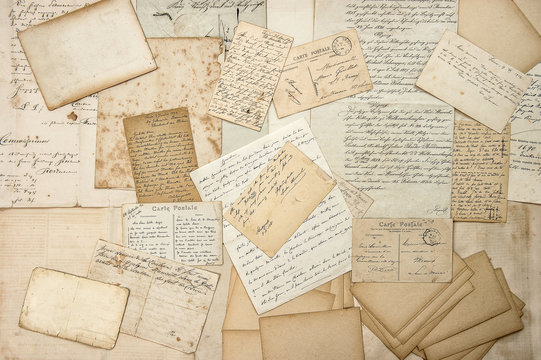 Old letters, handwritings, vintage postcards. Grungy paper textu