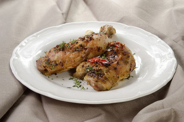 thyme chicken drumsticks on a plate