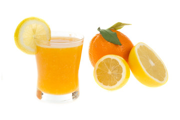 Juice in glass with citrus fresh fruit