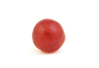 Red grape grain on white background.