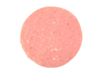 Closeup of one mortadela slice isolated on white background