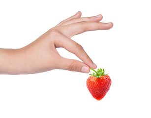 Female hand holding red strawberry isolated on white