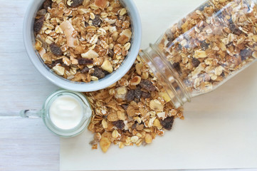 Muesli breakfast on a vintage wooden background