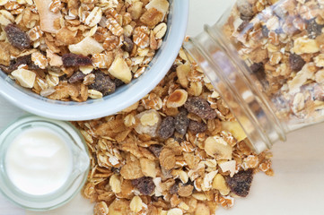 Muesli breakfast on a vintage wooden background