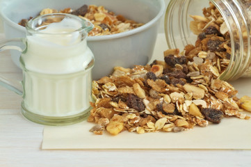 Muesli breakfast on a vintage wooden background