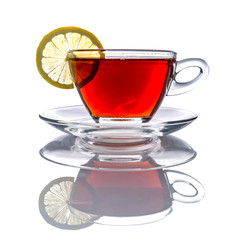 Cup of tea with lemon over white