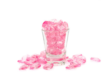 Fototapeta na wymiar pink hearts glass on white background