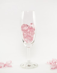 pink hearts glass  on white background