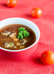 Spicy tomato soup with seafood