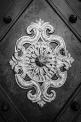 Forged decorative ornament old door. Black and white.
