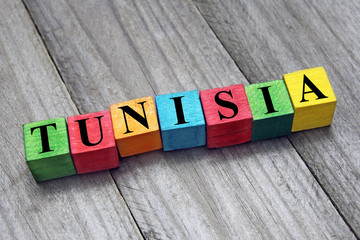 word tunisia on colorful wooden cubes