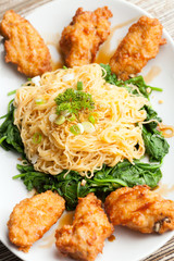 Chicken Wings with Noodles and Spinach