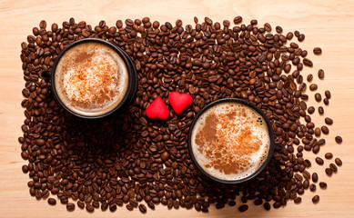 two coffee cups and two heart