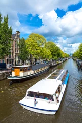 Fototapete Rund Amsterdam canals and  boats, Holland, Netherlands. © Sergii Figurnyi