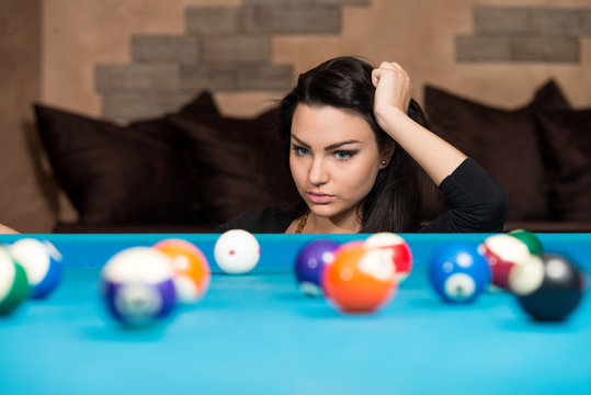 Portrait Of A Young Woman Concentration On Ball