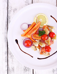 Fresh fish salad with vegetables