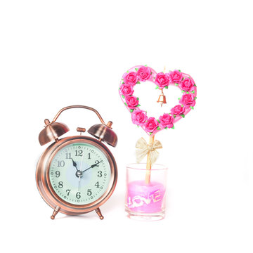 alarm clock and sign of love