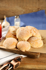 Fresh homemade bread buns from yeast dough with fresh garlic