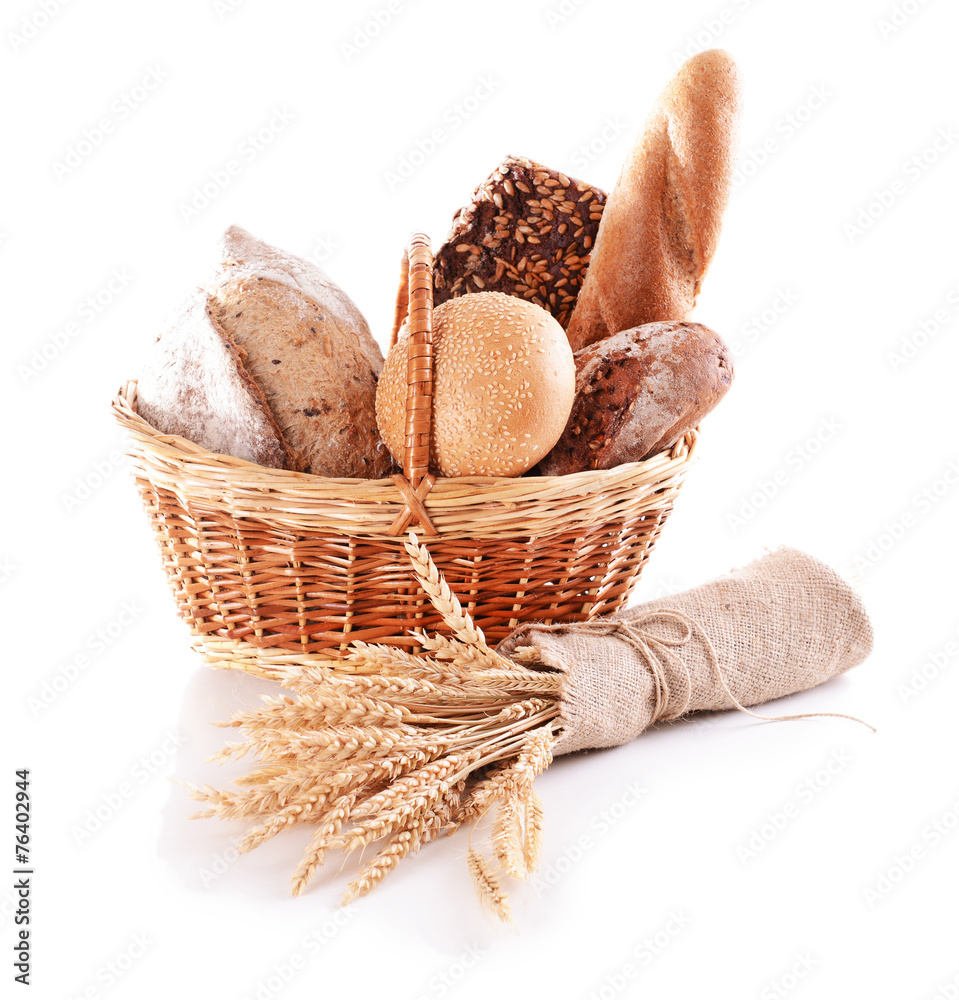 Canvas Prints different bread in wicker basket isolated on white