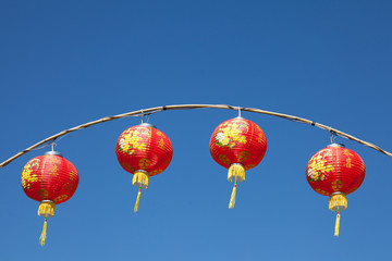Red chinese lanterns with blue sky