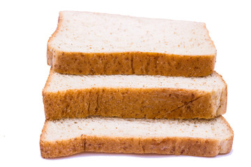 Sliced whole wheat bread on white background