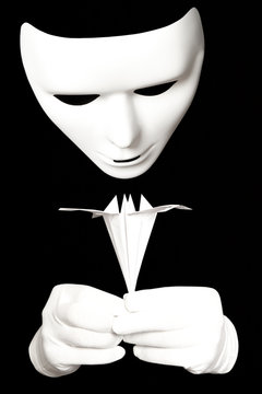 White mask and origami